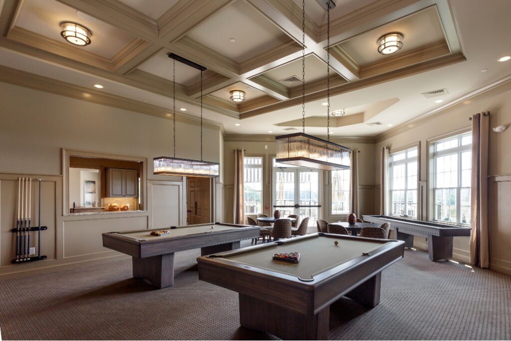 A Large Game Room With Pool Tables Refinished By Foggy Ridge Interiors