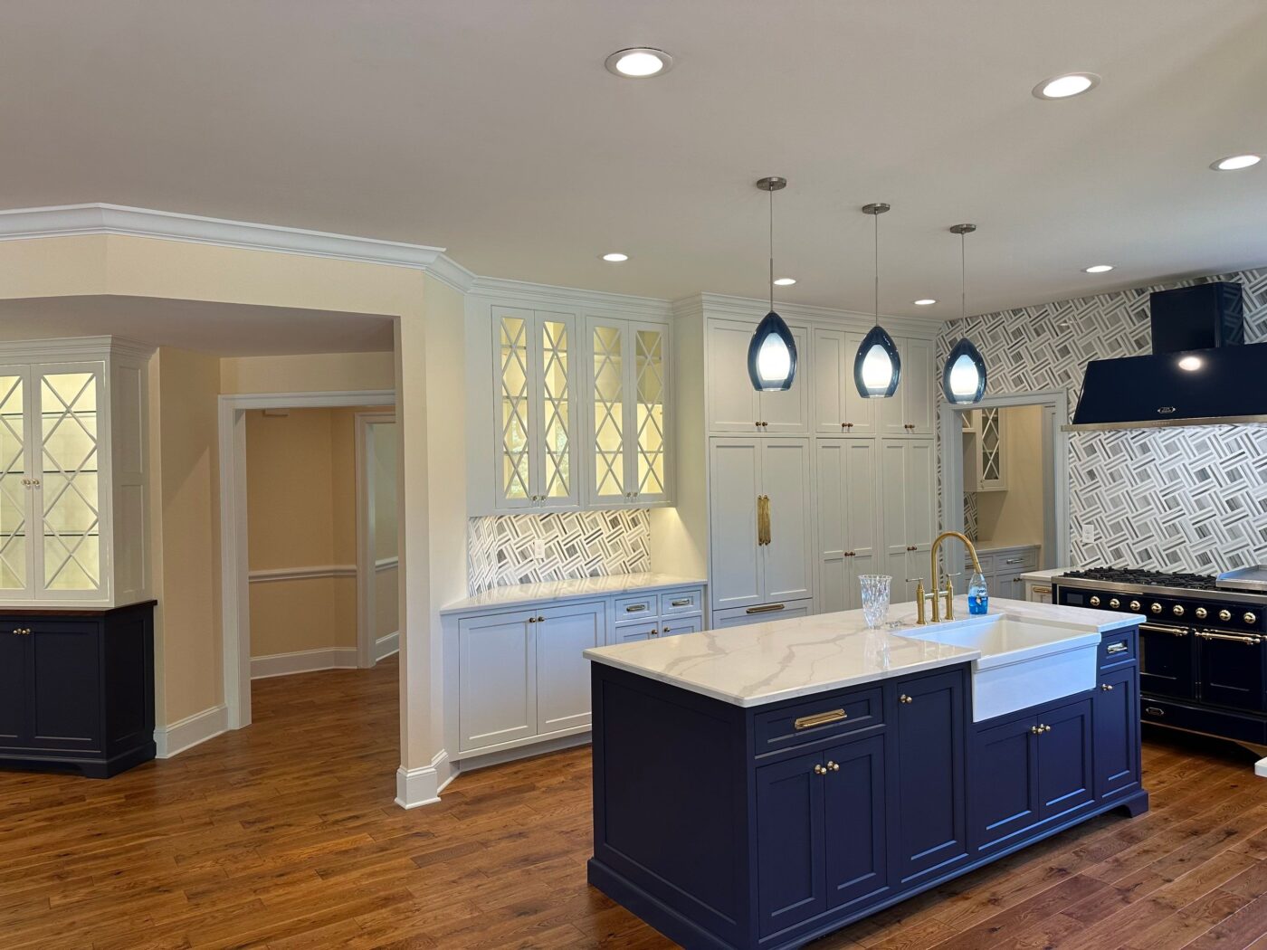 Kitchen Interior With Brand New Appliances And Lighting Fixtures