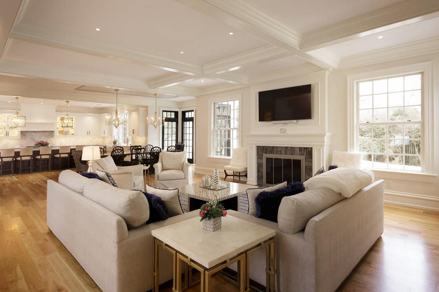 A Custom Living Room Interior With Couches Et Up Across From Each Other And A Tv Hung Up Above A Fireplace In Delaware County Pa