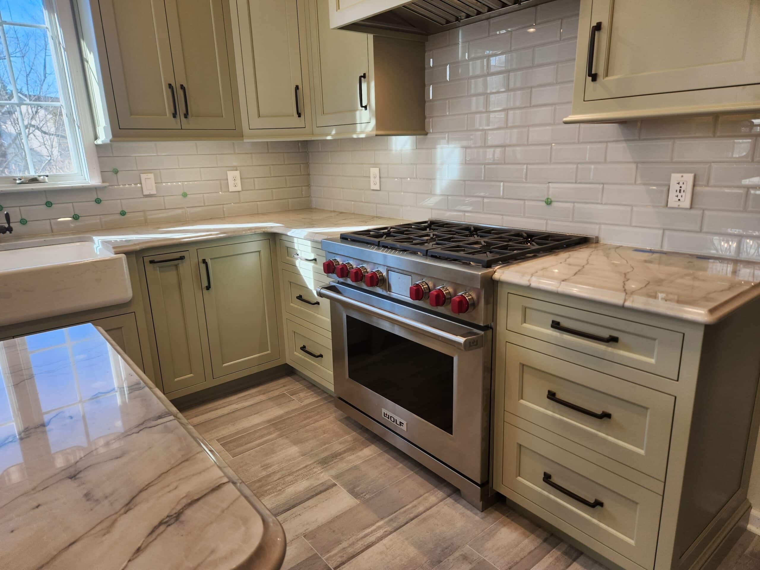 A Kitchen With A White Smooth Brick Baclsplash, Custom Drawers, And Brand-New Appliances, Completed By Foggy Ridge Interiors, Home  Remodeling Contractor In Lancaster County Pa