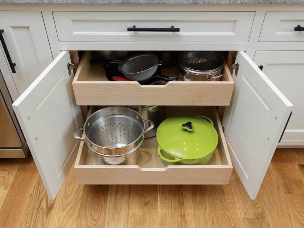 Pull-Out Cabinet Storing Pots And Pans In A Remodeled Small Kitchen Remodel Ideas